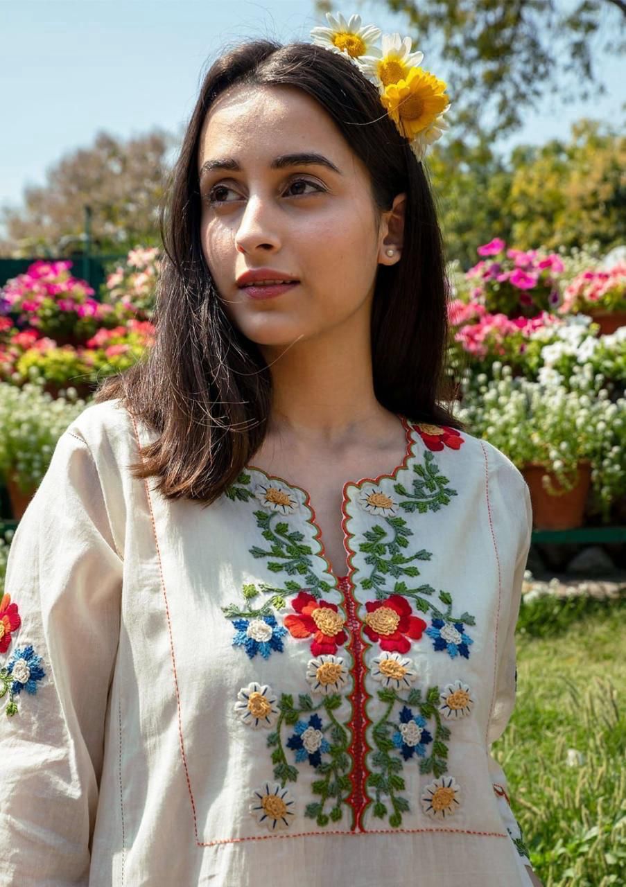 RAVISHING IVORY KALIDAR STYLE KURTA SET WITH COLOURFUL TREADWORK AND EMBROIDERY