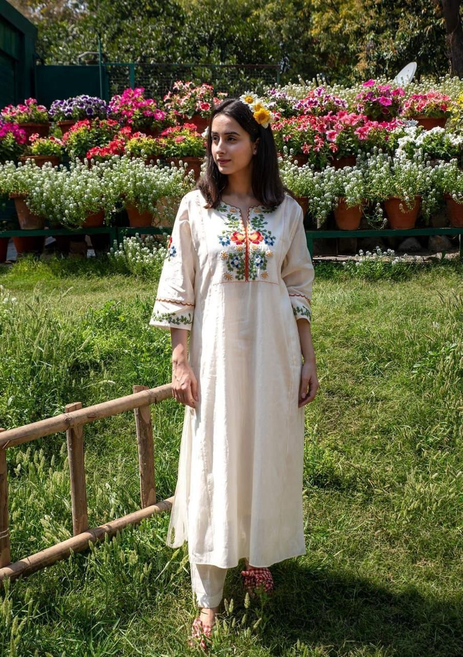 RAVISHING IVORY KALIDAR STYLE KURTA SET WITH COLOURFUL TREADWORK AND EMBROIDERY