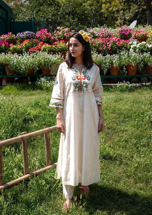 RAVISHING IVORY KALIDAR STYLE KURTA SET WITH COLOURFUL TREADWORK AND EMBROIDERY