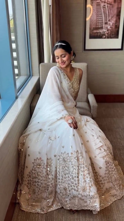 WHITE FAUX GEORGETTE EMBELLISHED & SEQUENCE LEHENGA