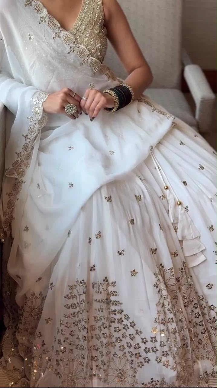 WHITE FAUX GEORGETTE EMBELLISHED & SEQUENCE LEHENGA