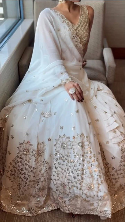 WHITE FAUX GEORGETTE EMBELLISHED & SEQUENCE LEHENGA