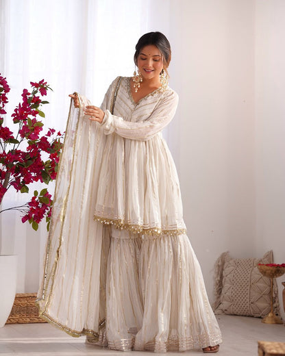 MAL CHANDERI WITH MIRROR & HAND WORK SHARARA SUIT
