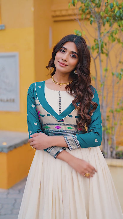 DESIGNER GOWN IN VICHITRA SILK WITH ZARI WEAVING WORK